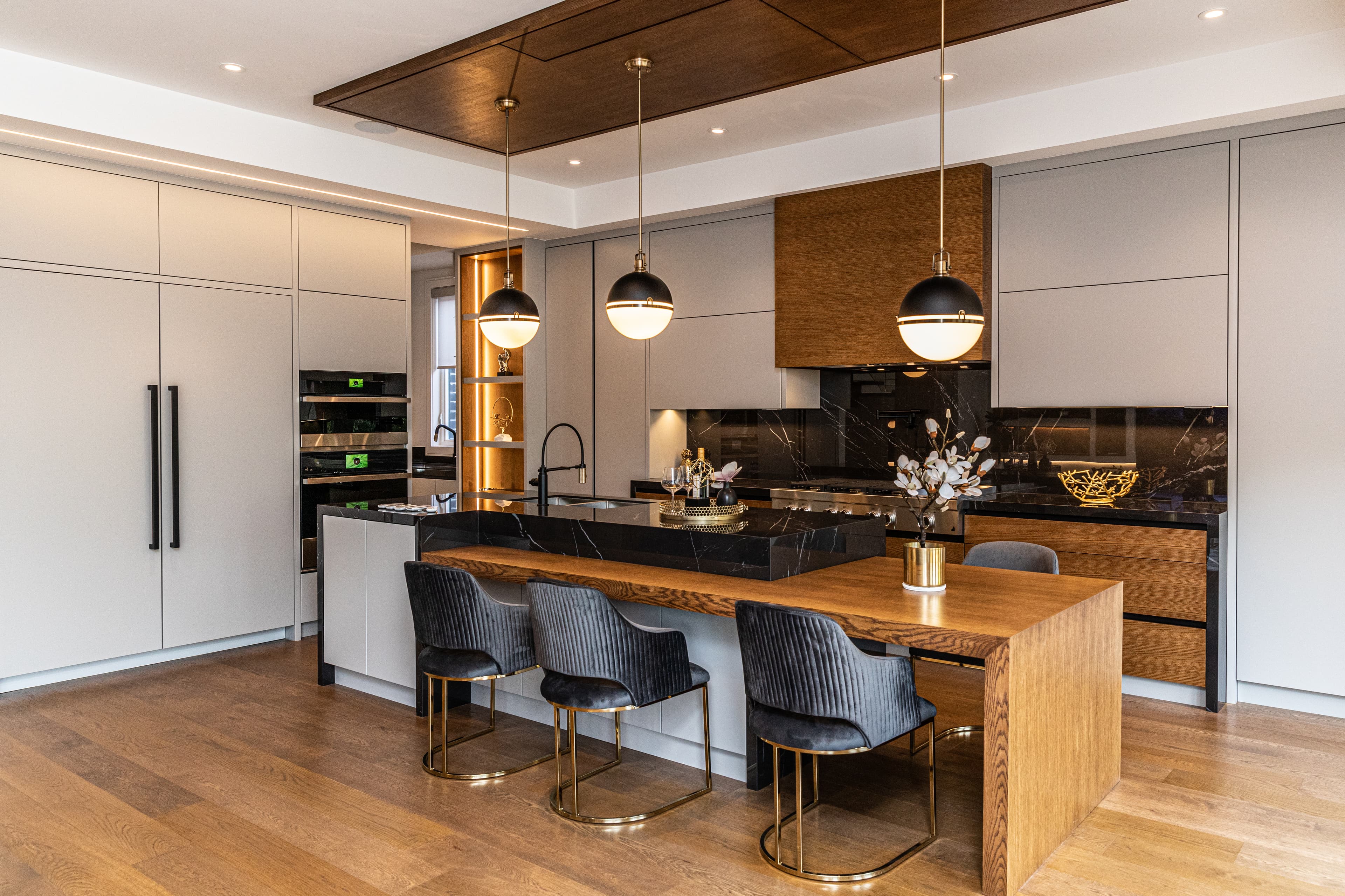Terrace, kitchen with black marble island and walnut details