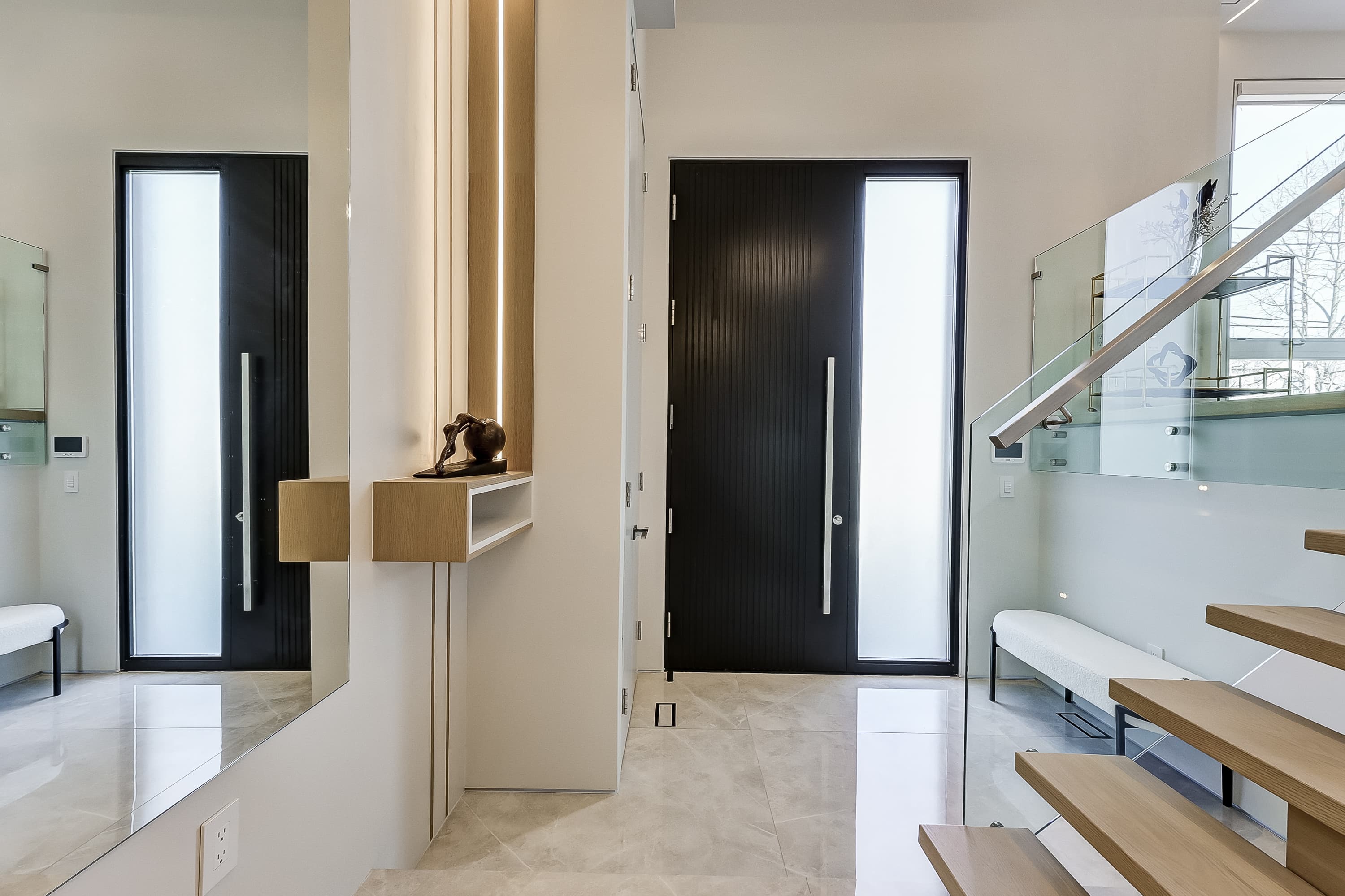 Poyntz Avenue, entryway with floating staircase