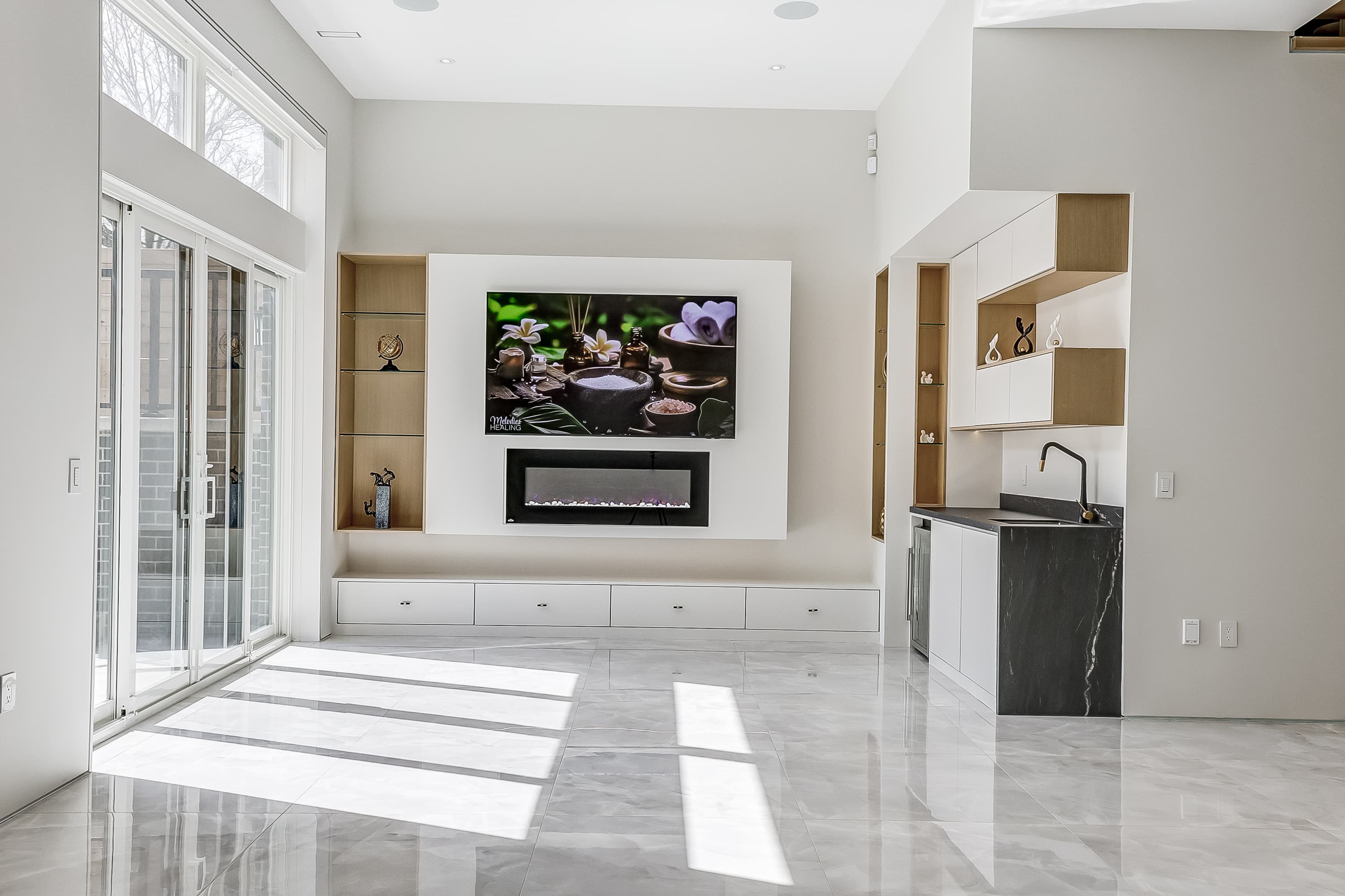 Poyntz Avenue, basement living area with fireplace